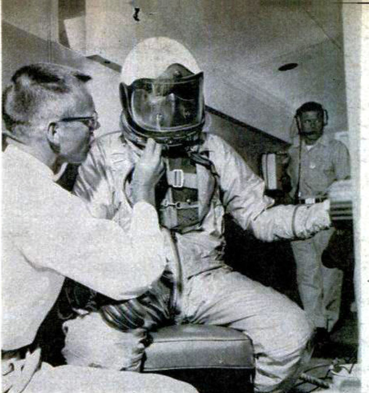 Popular Mechanices (May 1960) - More than an hour before take-off, the X-15 pilot is dressed in an $18,000 space suit made of heat-reflecting aluminum cloth. Taped to his body are sensing devices so that his rate of breathing, temperature and heartbeat can all be monitored 