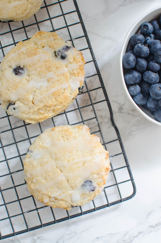 Glazed Blueberry Biscuits - delicious lightly sweetened biscuits with fresh blueberries and a glaze. Bojangles copycat!