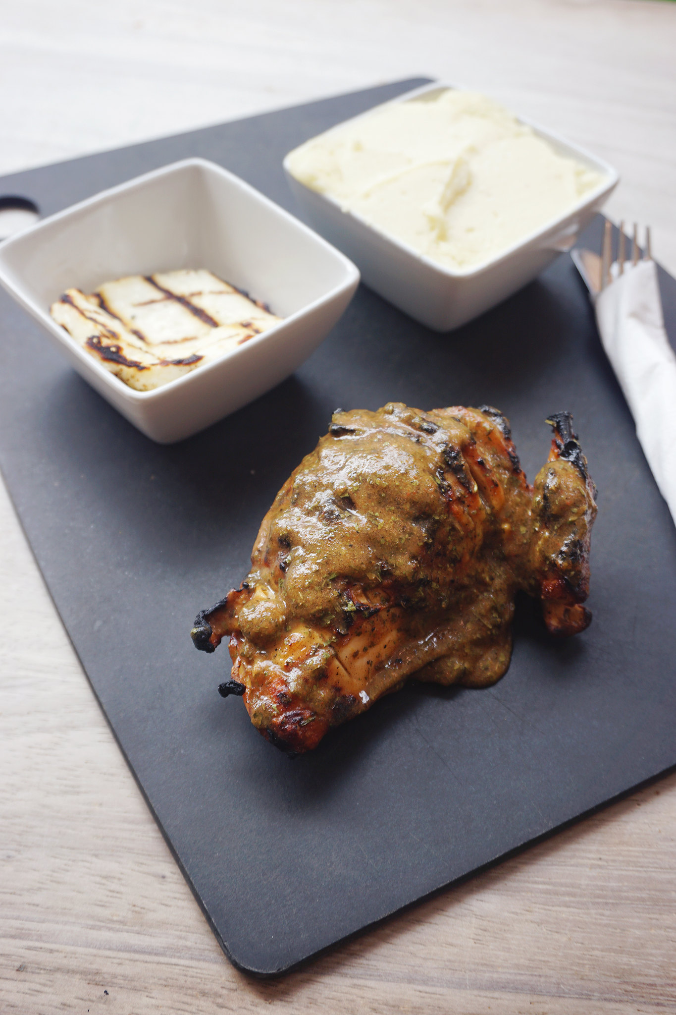 Roosters Piri Piri grilled chicken with Lebanese sauce, grilled halloumi and mashed potatoes | gluten free friendly restaurant chain | London + UK