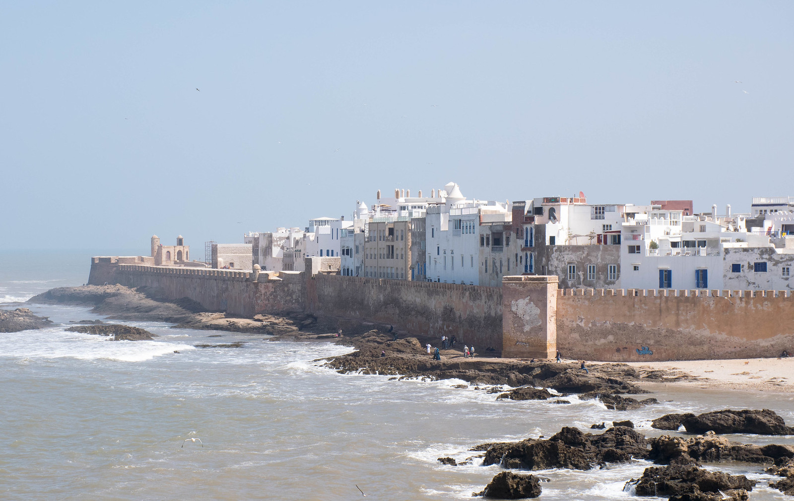 walking along these ocean walls to the city is one of the best things to do in Essaouira Morocco