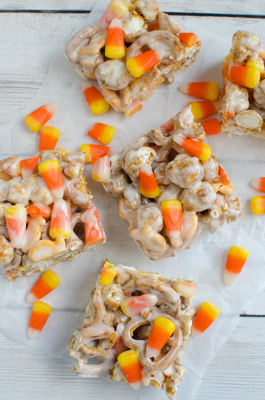 Caramel Corn Treats are the perfect sweet and salty fall snack! Caramel corn, pretzels, cheddar Goldfish, and candy corn all coated in melted marshmallow! You won't be able to stop snacking on these!