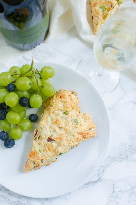 Cheesy Bacon Scones - delicious savory scones made with crispy bacon, cheddar cheese, and green onions. Perfect for brunch!