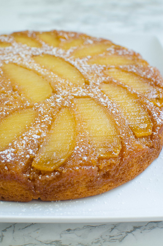 Apple Upside Down Cake - simple and delicious apple cake! Moist cinnamon-spiced cake topped with apples coated in butter and brown sugar. 