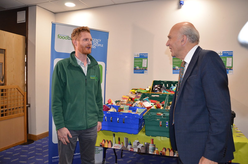 Ed from the Bournemouth Foodbank poses with Liberal Democrat, Vince Cable