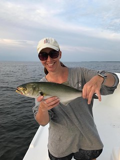Nora Long with a bluefish she caught