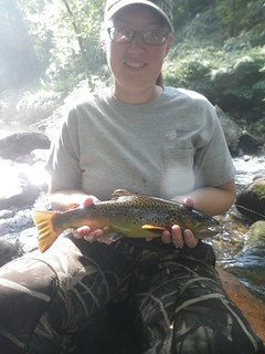 Girl with brown trout