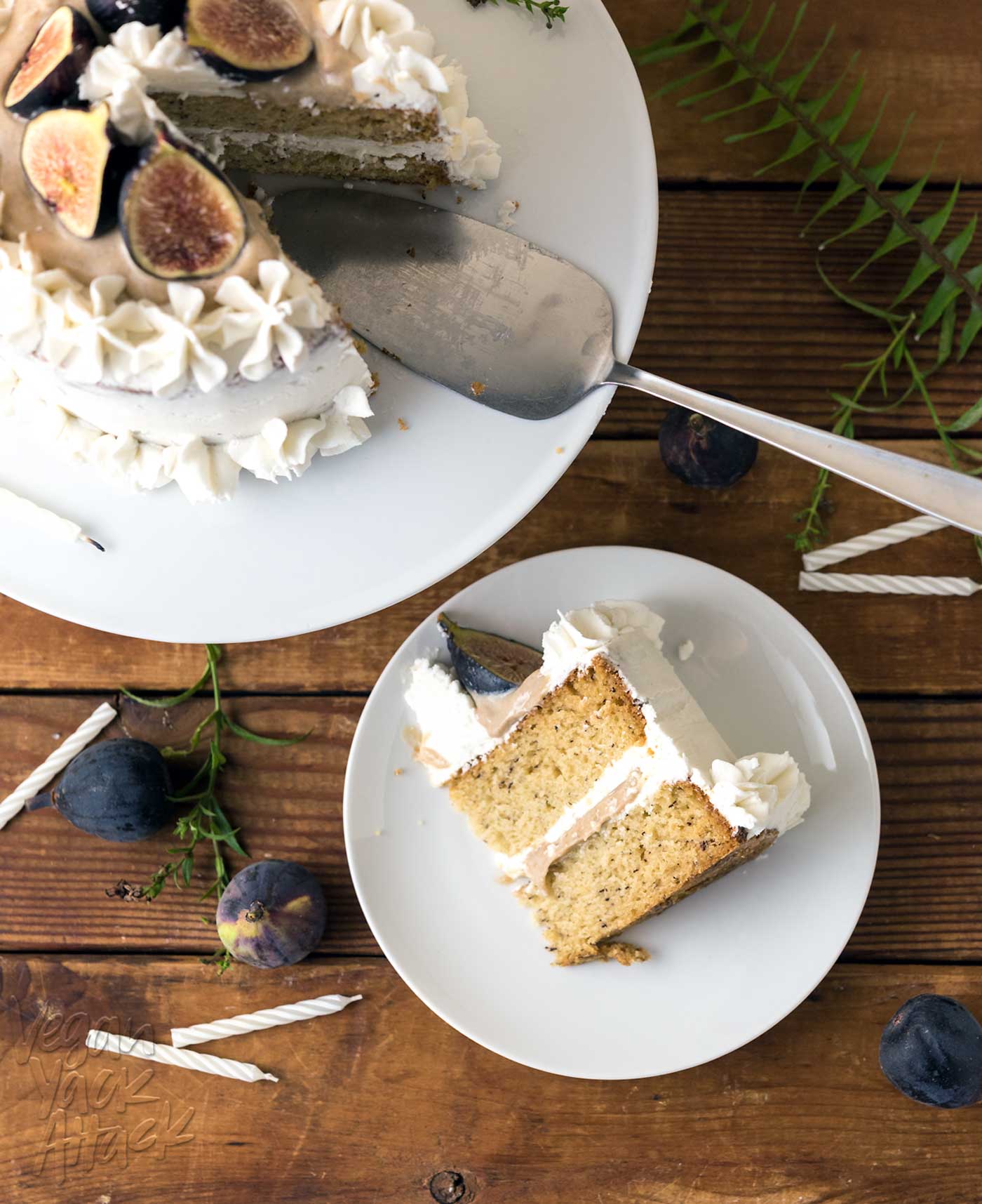 This Caramel Fig Vanilla Layer Cake has gorgeous layers of vegan buttercream, date caramel, and fluffy cake, topped with fresh figs! Soy-free, Dairy-free