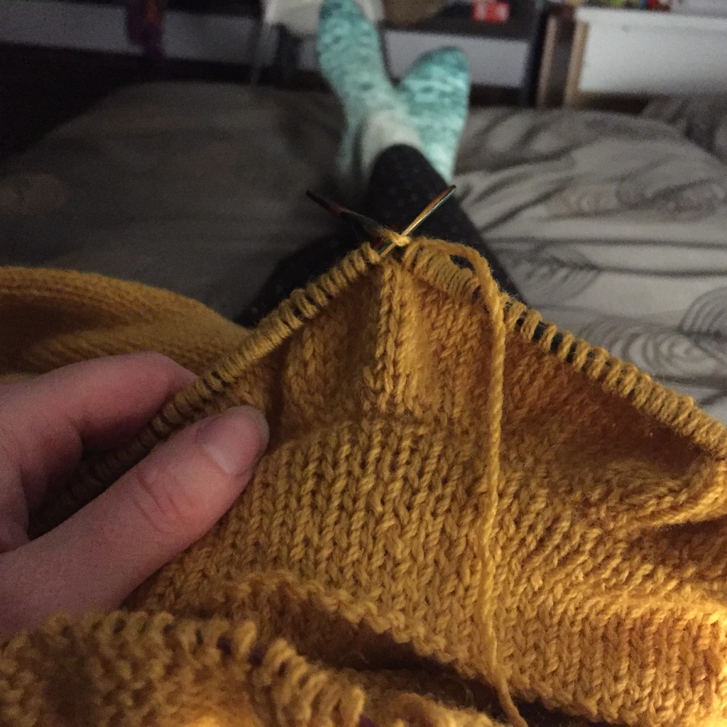 knitting away on a motel room bed in albury