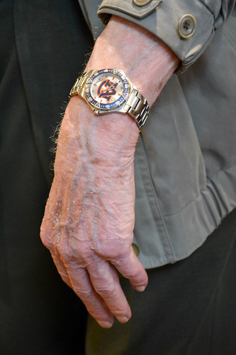 An Auburn watch featuring the interlocking AU logo on George Baker's wrist