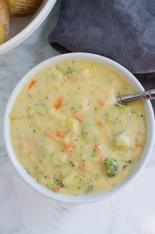 Broccoli Cheddar Soup - easy kid-friendly soup! A creamy soup with broccoli, carrots, and cheddar cheese!