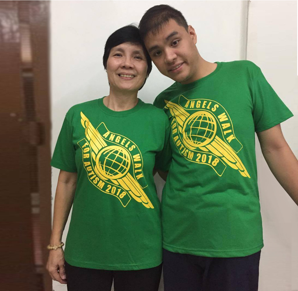 The image shows Ms. Janette Peña and her son Muneer wearing Angels Walk 2018 shirt.