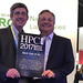 John Sarrao receives the award for best use of AI from HPCWire’s Tom Tabor.