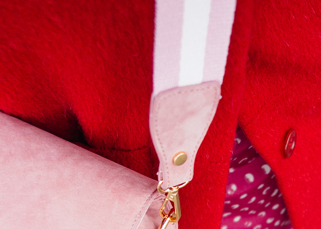 pink bag and red coat