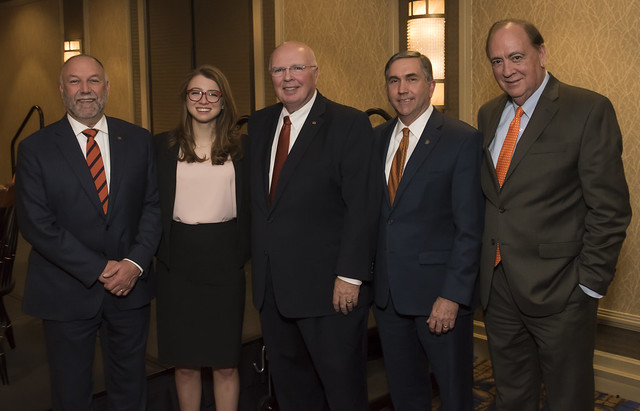 Retiring Provost Timothy Boosinger, center, is pictured with President Steven Leath, graduate Sarah Pitts, Dean of the College of Veterinary Medicine Calvin Johnson and President Emeritus Jay Gogue. 