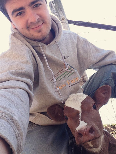 Ryan Kuster with a calf