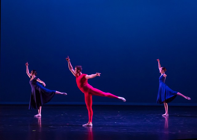 Three dancers perform on stage during a production of Take a Walk in Her Shoes. 