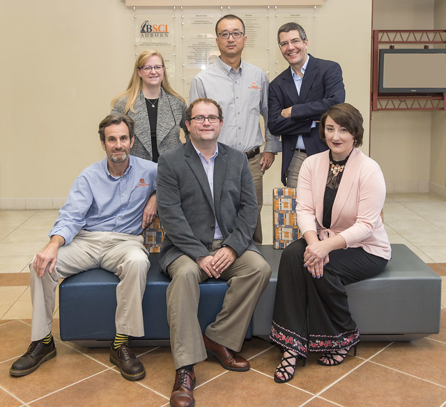 A project team at Auburn University poses for a group photo.