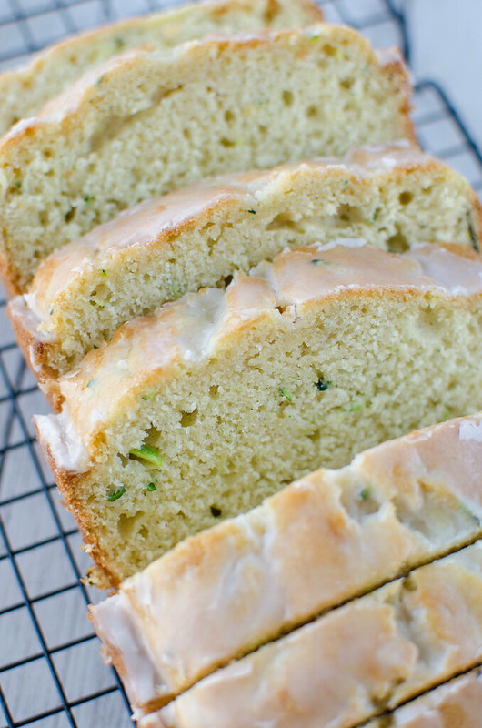 Meyer Lemon Zucchini Bread - moist and delicious quick bread with a sweet and tart glaze. The perfect way to use the seasonal fruit! 