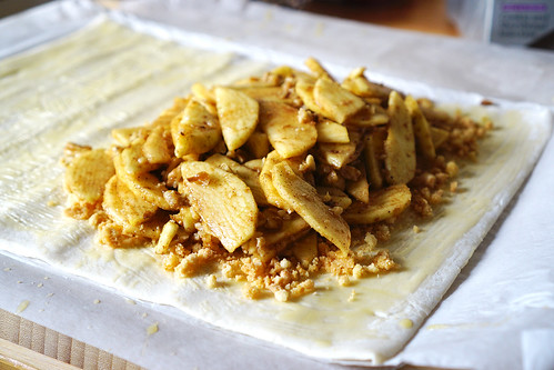 How to make a gluten free apple and walnut strudel: adding the spiced apples and walnuts on top of the pastry