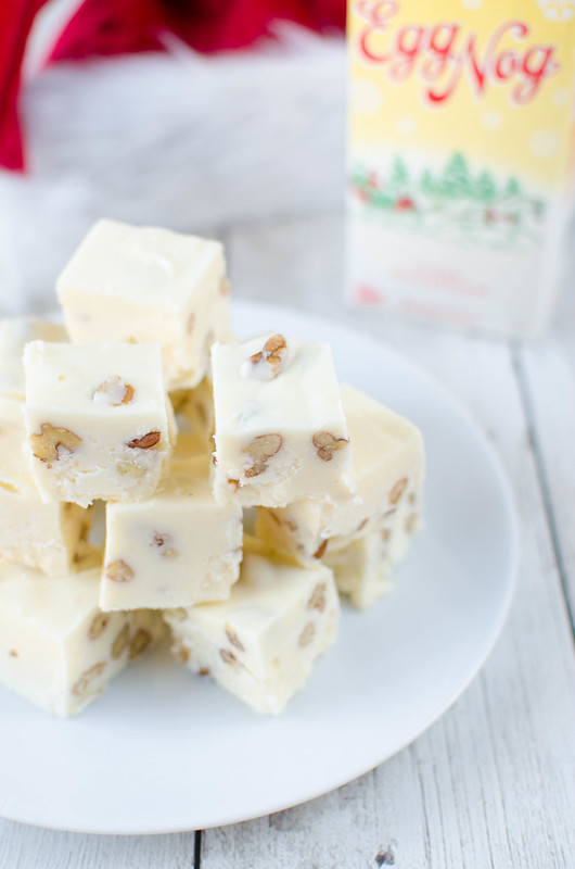 Eggnog Fudge - rich and creamy eggnog fudge with pecans. The perfect sweet treat for your holiday cookie tins!