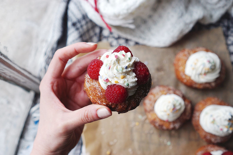 Gluten free churro donut rings | rolled in cinnamon sugar and topped with whipped cream, Waitrose fruity confetti sprinkles and fresh raspberries
