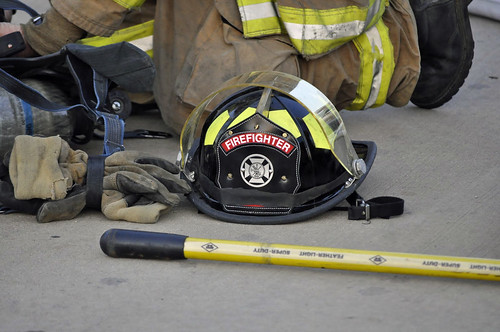 Firefighter hat | Firefighter hat and gear during a fire spr… | Flickr