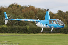 G-FRYA - 2006 build Robinson R44 Raven II, lifting for departure from Barton
