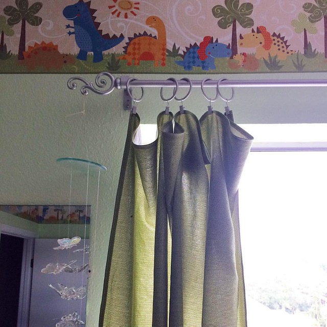 Made some green curtains for the nursery to match the dinosaur border. 💚