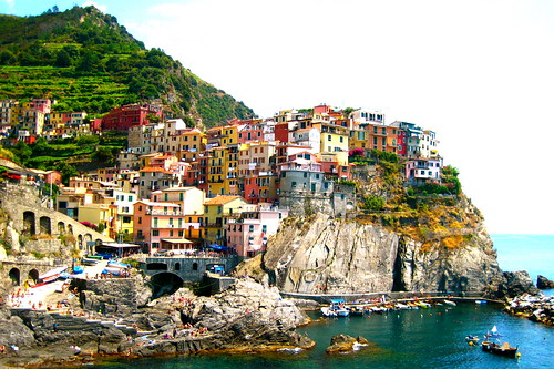 Colors of the Coast: A view of the colorful buildings on the clifftop of Cinque Terre, Italy.