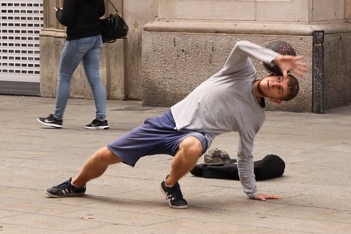 Barcelona street performer balancing football