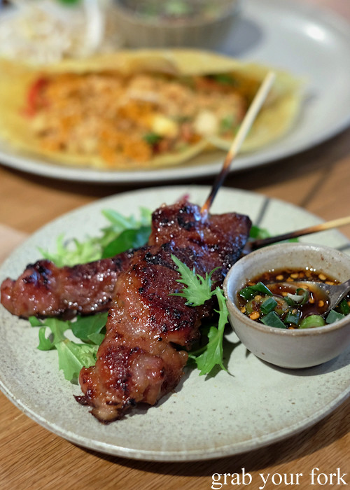 Moo ping grilled pork skewers at Chat Thai at Gateway Sydney in Circular Quay