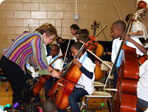 Baltimore Symphony Music Director Marin Alsop coaches students in the BSO OrchKids program