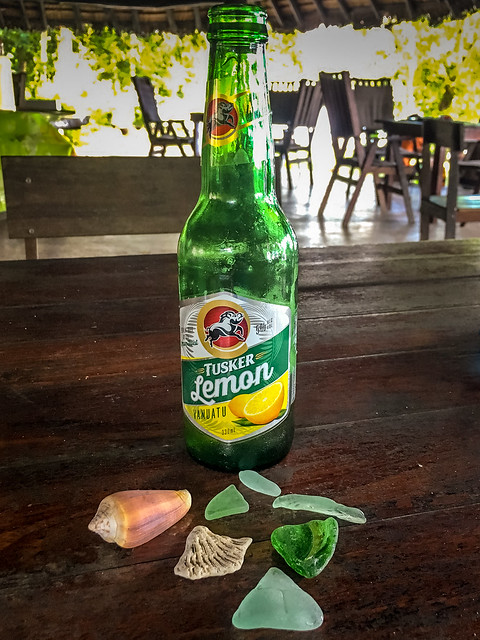 Tusker beer, seaglass and shells