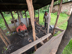 Blacksmith making  sharp tools from old car parts. Mt Kilimanjaro, Tanzania