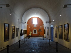 Religious paintings of local artists at exhibition in the ancient buildings of Monastery of Santa Catalina