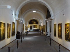 Religious paintings of local artists at exhibition in the ancient buildings of Monastery of Santa Catalina