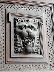 Interesting face, door to old town hall