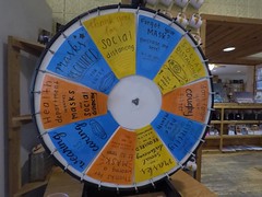Wheel of Fortune with face mask and social distancing messages