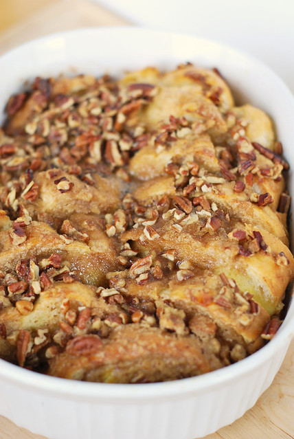 Baked French Toast with Pralines - sliced french bread soaks all night and is then topped with buttery candied pecans and baked until puffed and golden! Perfect for a holiday morning!