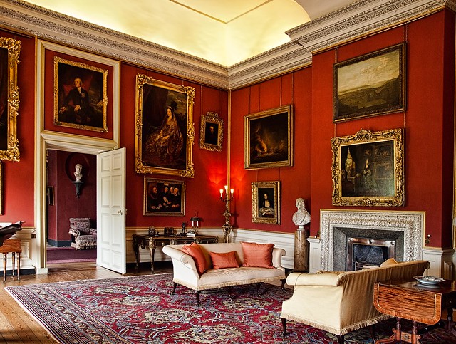 The Red Room of Petworth House which contains paintings by