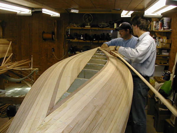Building a cedar strip canoe The bottom is taking shape 