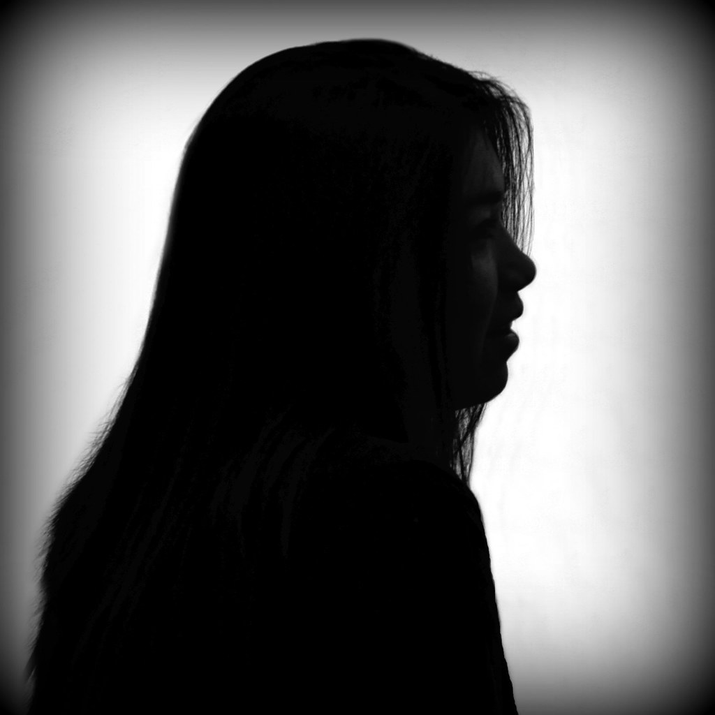A Silhouette Portrait of the Reluctant Asian Girl 
