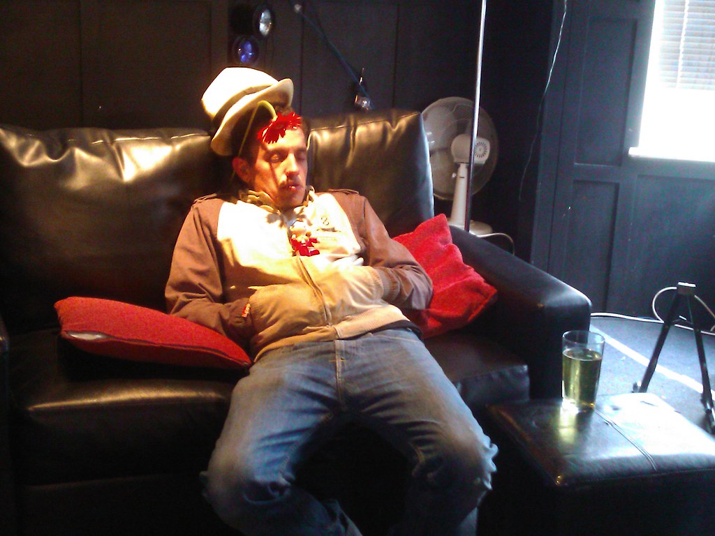 Guy who passed out on a sofa at my pub. So we put flowers… | Flickr