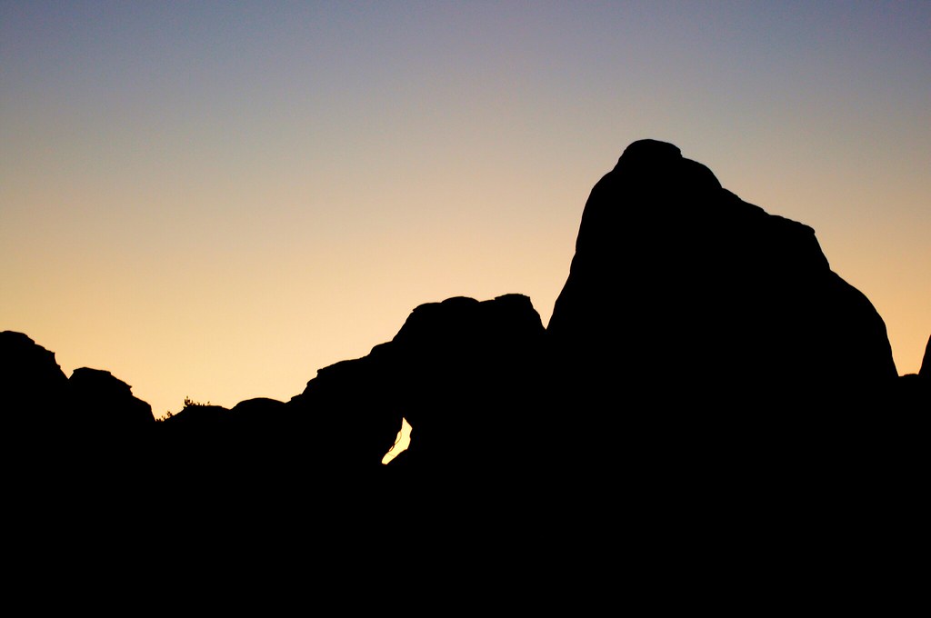 Photo Favorite: Twilight silhouette of sandstone fins and Skyline Arch, from Devils Garden Campground, Arches National Park, September 20, 2011 (Pentax K-r) 
