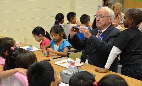 Under Secretary Kevin Concannon taking a photo of his lunch mates at Arcola Elementary School in Silver Spring, Md.