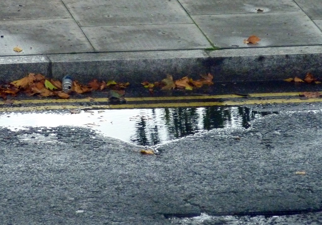 road, puddle, gutter, litter, pavement, gascoyne road e9 a… Flickr