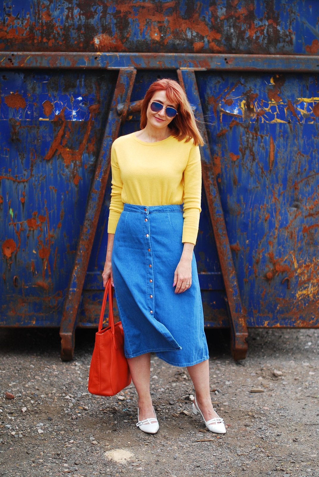 Primary brights colour blocking: Yellow sweater, denim midi skirt, orange tote bag, white pointed flats | Not Dressed As Lamb