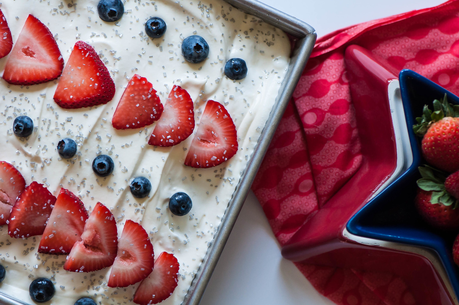 Keep things festive with this 4th of July Poke Cake. It’s simple to prepare, starting with a cake mix, and will definitely steal the show.