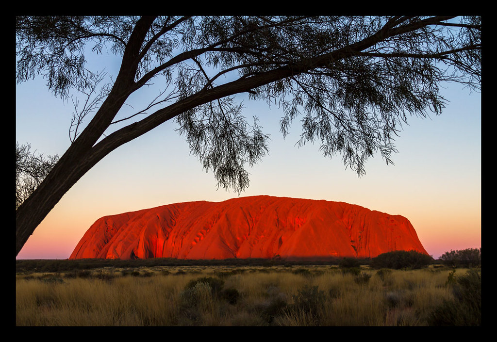 See The Sunset And The Incredible Bright Red Color Of Mountain Uluru