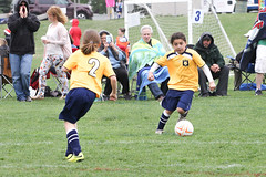 Malden girls moving the ball up the field.
